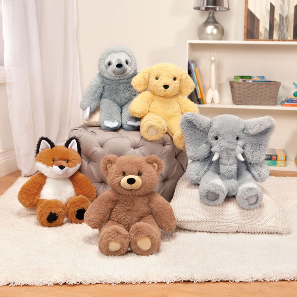 18" Oh So Soft Teddy Bear - Grouped with the Oh So Soft Fox, Elephant, Sloth and Puppy in a Christmas scene