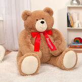4' Big Hunka Love Bear - Seated golden brown bear with red satin bow with tails, left tail is personalized in white lettering with "Benjamin" image number 4