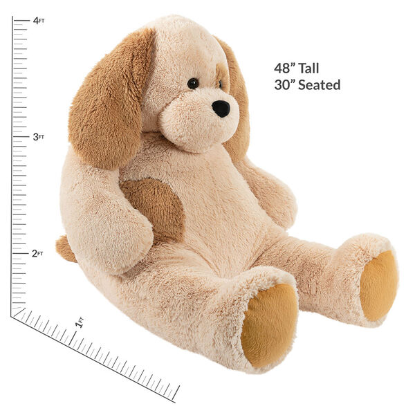 4' Cuddle Puppy - Side view of seated tan plush puppy with measurements of 48" tall or 30" seated