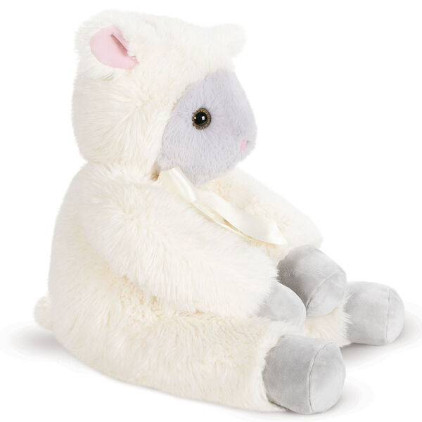 20" World's Softest Lamb - Side view of seated ivory lamb with tail, light grey hooves and muzzle