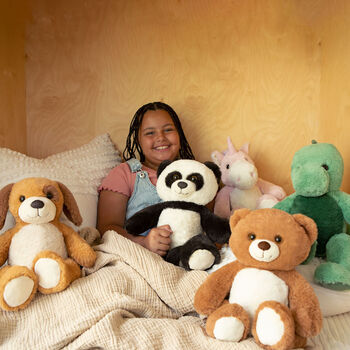15" Cuddle Chunk Panda - Panda, Bear, Unicorn, Dinosaur, and Puppy in a bedroom scene with child