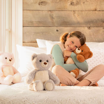 15" Cuddle Chunk Teddy Bear - Model in bedroom scene with Grey, Honey and Buttercream Bears