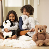 18" Oh So Soft Teddy Bear - Front view of honey brown teddy bear with penguin and elephant and children image number 5