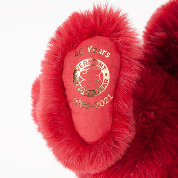20" Special Edition 40th Anniversary Bear - Close up of red foot pad with metallic gold Vermont Teddy Bear logo, "40 Years" amd 1981-2021". 