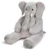 6' Giant Cuddle Elephant - 3/4 view of seated grey plush elephant with white fabric tusks, floppy ears and long trunk image number 4
