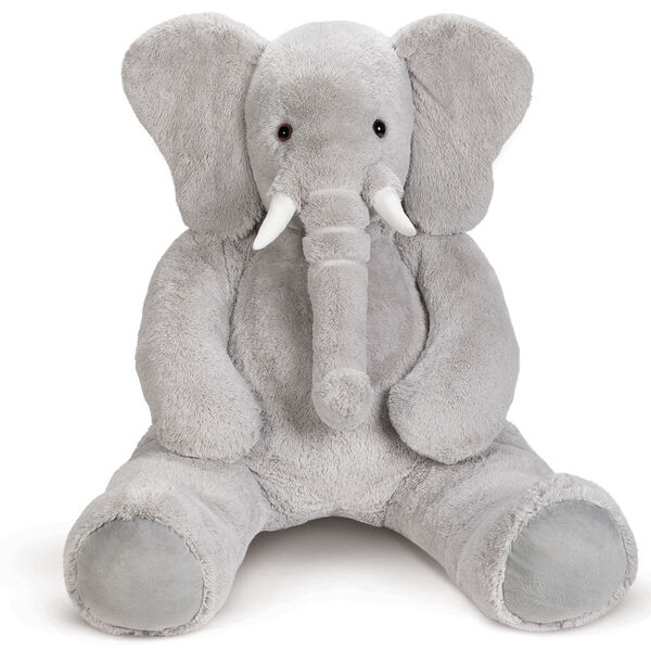 6' Giant Cuddle Elephant - Front view of seated grey plush elephant with white fabric tusks, floppy ears and long trunk