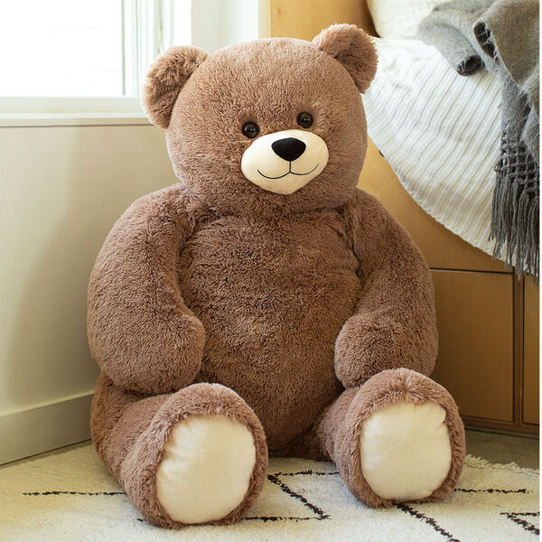 ' Cuddle Teddy Bear- Front view of seated mocha latte teddy bear in a bedroom scene image number 2