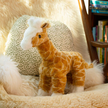 15" Classic Giraffe - 3/4 view of standing jointed plush animal giraffe in a living room scene