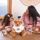 15" "I HEART You" Personalized T-Shirt Bear - Bear in white t-shirt that says I "Heart" You with models in a dining room image number 2