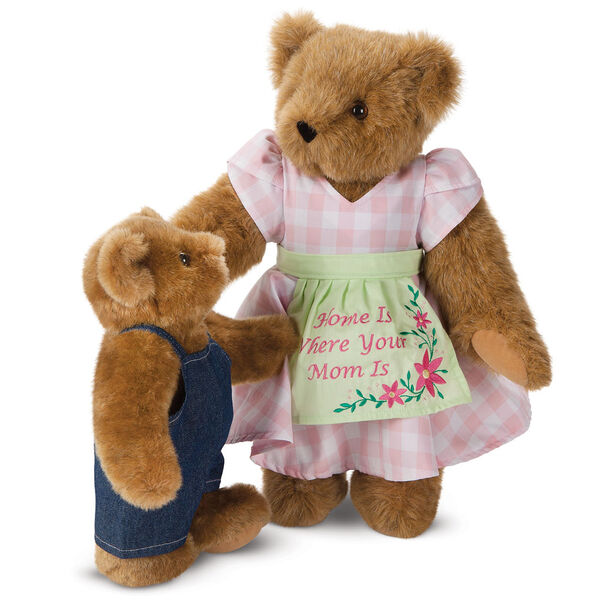 15" Home Is Where Your Mom Is Bear - Front view of standing jointed bear wearing a pink gingham dress, green bow and apron with floral embroidery and says "Home is Where Your Mom Is" presented as a Mother's Day gift