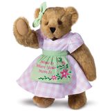 15" Home Is Where Your Mom Is Bear - Front view of standing jointed bear wearing a pink gingham dress, green bow and apron with floral embroidery and says "Home is Where Your Mom Is" - Honey brown fur image number 3
