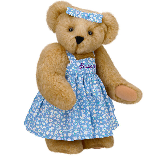15" Mother Bear - Three quarter view of standing jointed bear dressed in blue floral dress and hair bow personalized with "Susan" in purple on bodice of dress - Honey brown fur image number 0