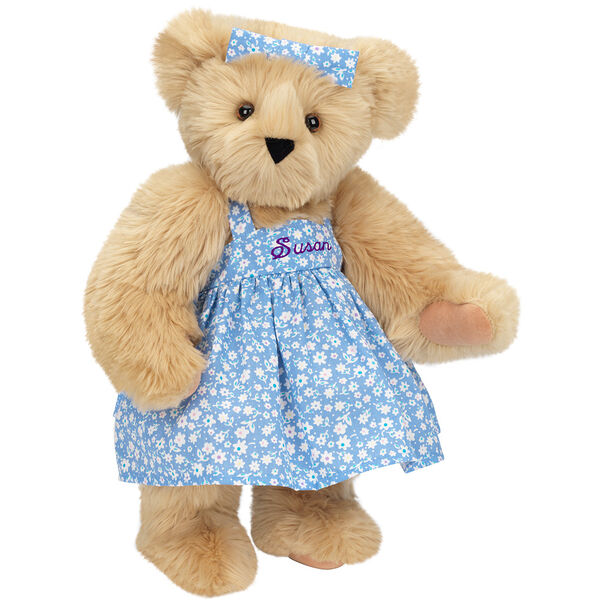 15" Mother Bear - Three quarter view of standing jointed bear dressed in blue floral dress and hair bow personalized with "Susan" in purple on bodice of dress - Maple brown fur