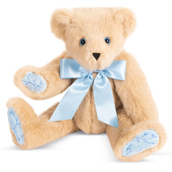 15" Bluebell Blossoms Bear - 15" seated jointed buttercream bear with blue satin bow, blue eyes and blue floral paw pads